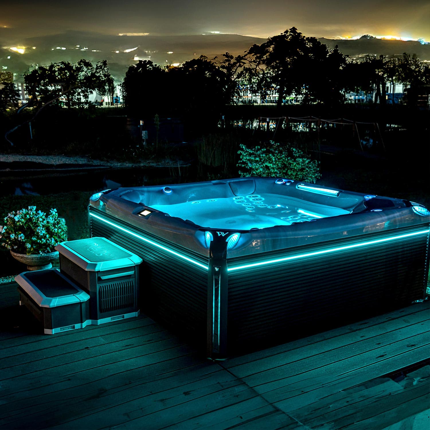 Luxury hot tub in a private outdoor setting at night