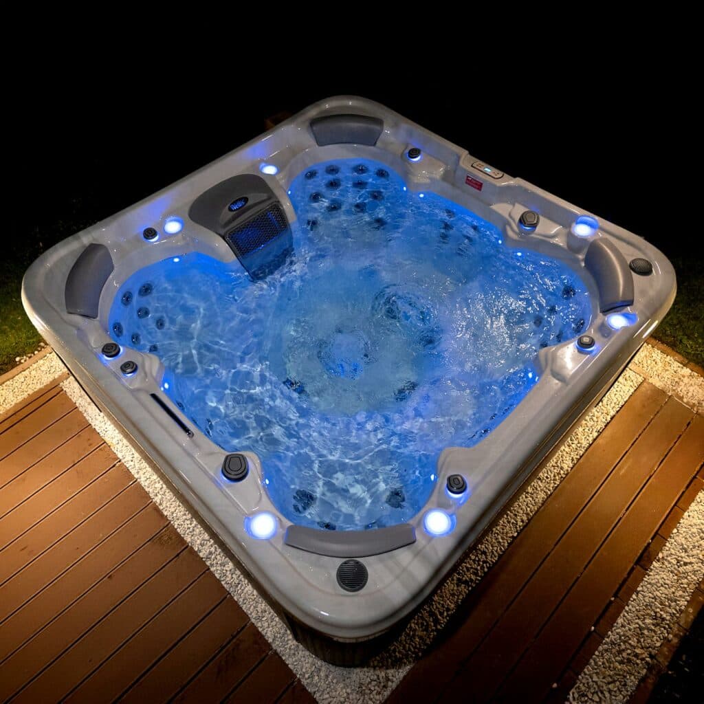 Wellis CityLife hot tub showcasing modern design and social seating in an urban setting